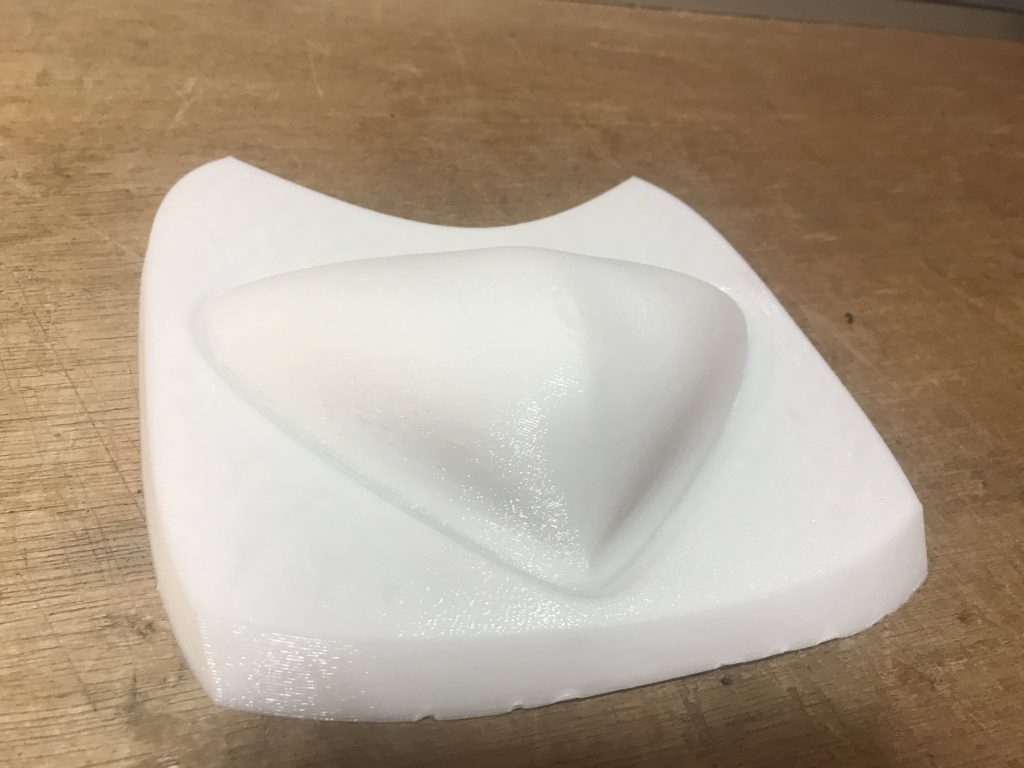 White 3D print of a mold for vacuum forming process